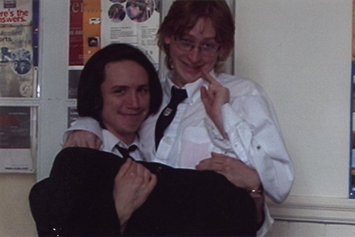 Me in the arms of my good friend Celyn, both of us giving disturbing queer sly grins at the camera.